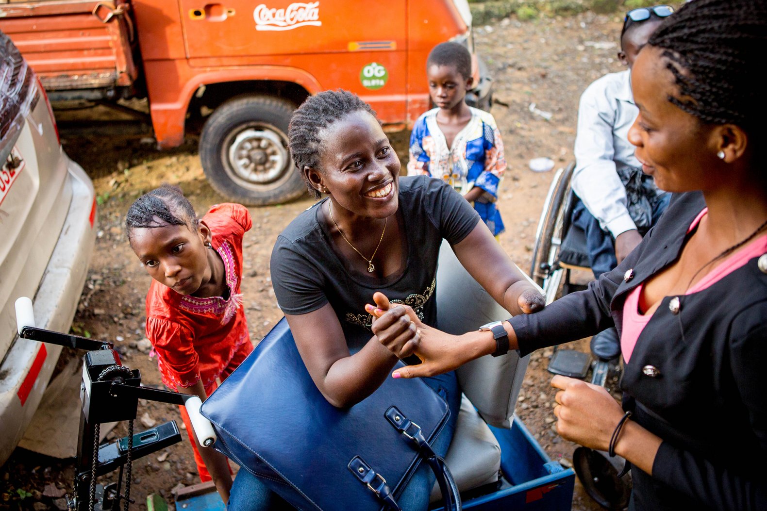 girls shaking hands in sierra leone